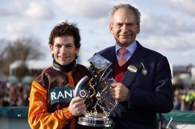 Jockey Sam Waley-Cohen and father Robert Waley-Cohen after winning the Grand National. PA