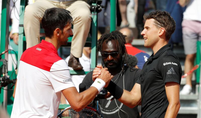 Tennis - ATP - Monte Carlo Masters - Monte-Carlo Country Club, Monte Carlo, Monaco - April 19, 2018   Austria's Dominic Thiem shakes hands with Serbia's Novak Djokovic after winning their third round match   REUTERS/Eric Gaillard