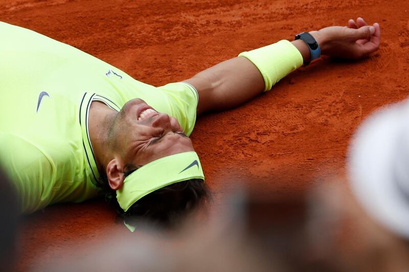 Nadal lays on the clay as he defeats Thiem. AP Photo