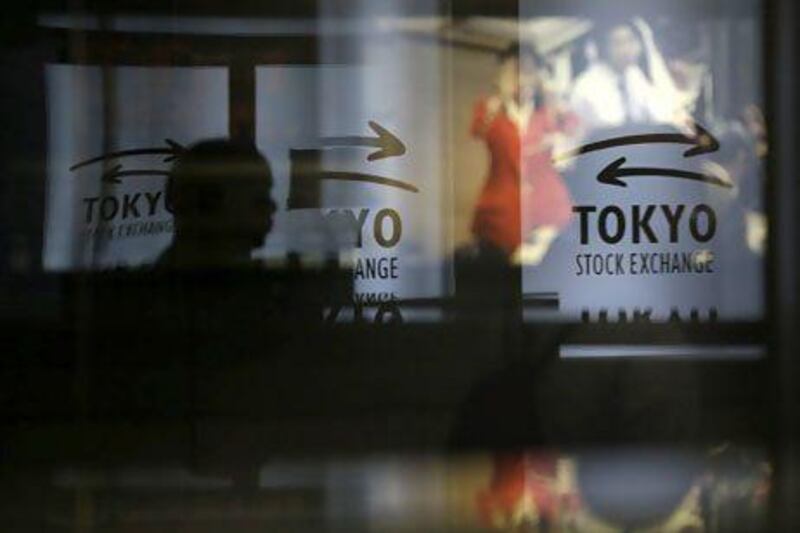 The Nikkei Stock Average tumbled 6.4 per cent yesterday, its sixth loss in the last seven sessions. Toru Hanai / Reuters