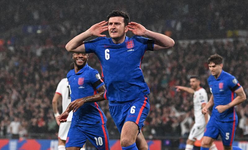 England defender Harry Maguire celebrates after scoring the opening goal. AFP