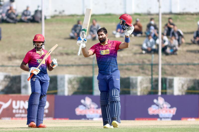 UAE captain Muhammad Waseem celebrates his century in the Cricket World Cup League 2 match against Papua New Guinea at the TU International Cricket Stadium in Kathmandu, Nepal. Subas Humagain for The National