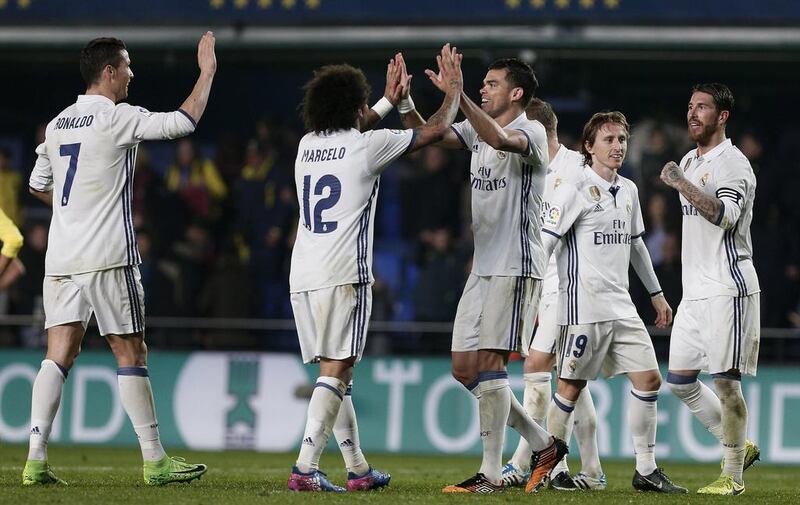 Real Madrid players celebrate after defeating Villarreal. Miguel Angel Polo / EPA