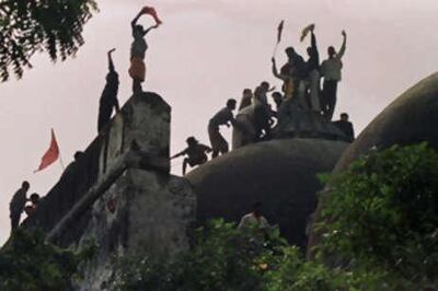 Hindu fundamentalists celebrate the destruction of the Babri mosque in 1992