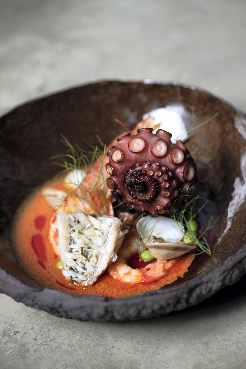 A bouillabaisse curry with octopus, clams and seasonal seafood.