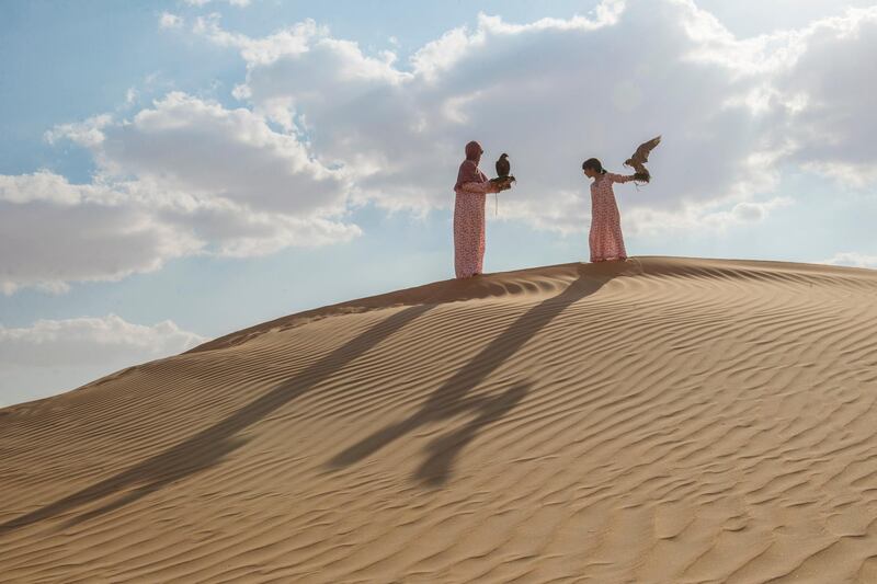 
Ayesha Al Mansoori began to learn falconry from her father at the age of 4. She has raised her daughter Osha with falcons since infancy.

In general Falconry transfer from Father to Son but now this has been slowly changing in UAE, the transfer of skills has altered mother to daughter ,Abu Dhabi,UAE ,Vidhyaa for The National