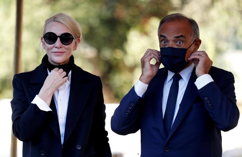 Cate Blanchett stands next to the director of the 77th Venice International Film Festival, Alberto Barbera, as she arrives. Reuters