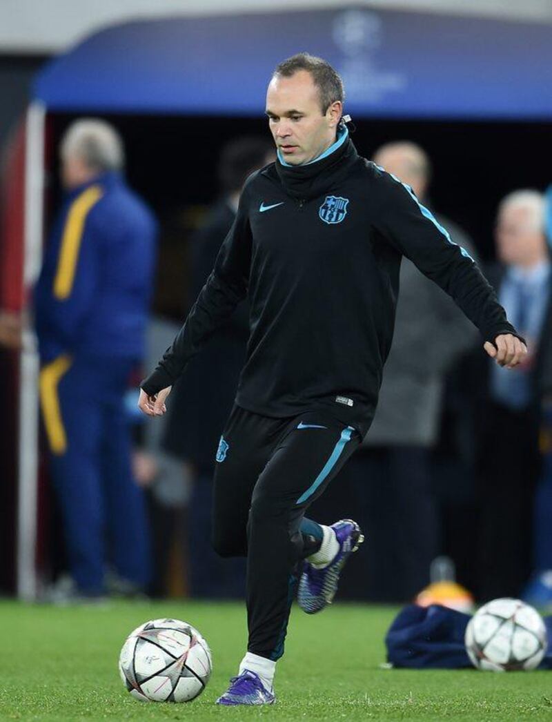 epa05175775 Barcelona's Andres Iniesta during a training session at the Emirates Stadium in London, Britain, 22 February 2016. Barcelona play Arsenal in a Champions League final 16 soccer match at the Emirates Stadium in London 23 February.  EPA/ANDY RAIN