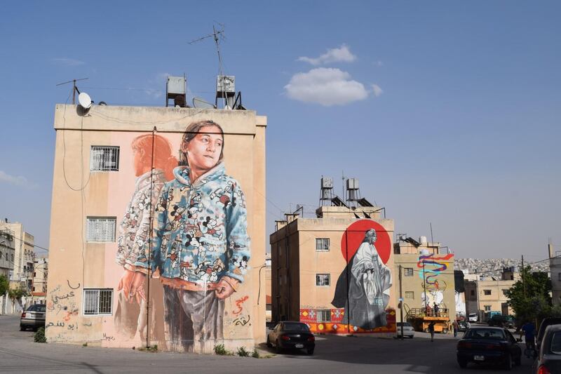 A four-piece mural installation in East Amman, featuring work by Fintan Magee (Australia), Suhaib Attar (Jordanian), Dina Saadi (Syrian-Russian based in Dubai) and Hombre SUK (Germany). Courtesy Baladk Project