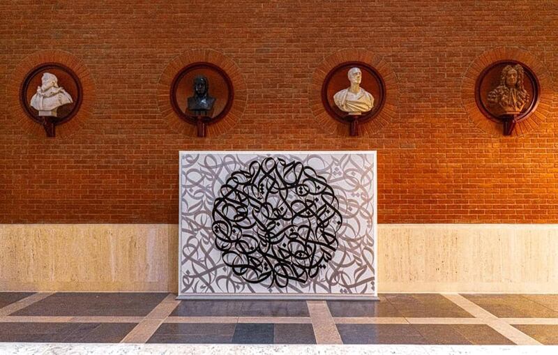 London, UK: part of the British Library's exhibition Writing: Making Your Mark exhibition, this work by eL Seed was on show, beneath the four founders of The British Library. The show ran until August 27, 2019. Instagram / eL Seed