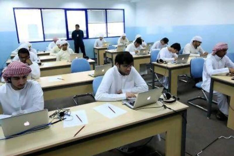 Students at a computer lab at the Sharjah Institute of Technology, which will be taken over by Adveti.