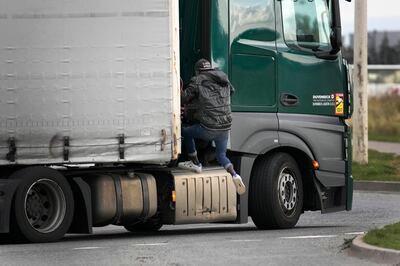 Just two to three migrants will successfully sneak on to a lorry per day, authorities say. AP.