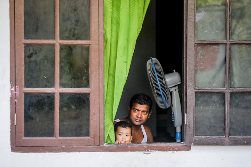 A Rohingya refugee plays with his son at a shelter ahead of World Refugee Day in Medan, North Sumatra, Indonesia.  World Refugee Day is marked annually on 20 June. According to the UNHCR, more and more refugees today live in urban settings outside refugee camps. Some crises have lasted so long that the tent camps became built-up urban areas.  EPA