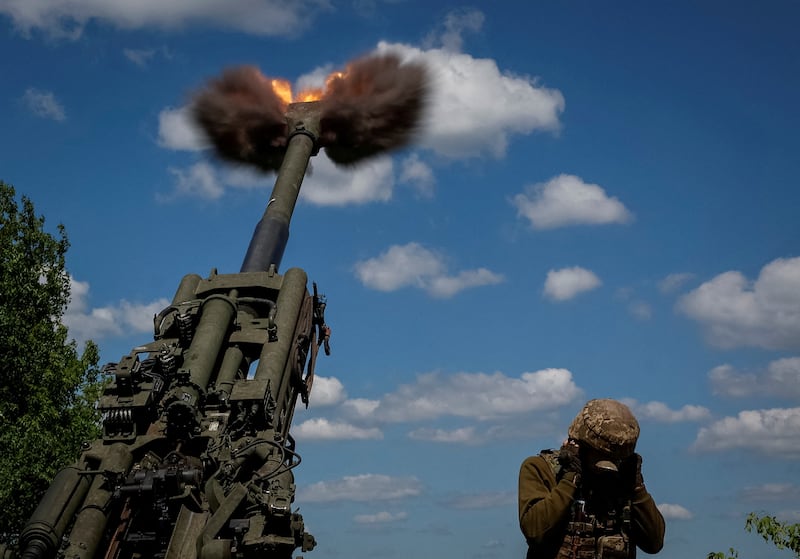 Ukrainian troops fire a shell from a M777 Howitzer in the Donetsk region of eastern Ukraine. Reuters