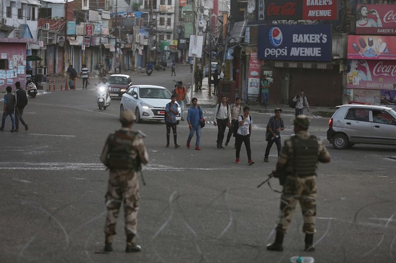 Indian paramilitary soldiers stand guard during curfew like restrictions in Jammu, India, Monday, Aug. 5, 2019. AP Photo