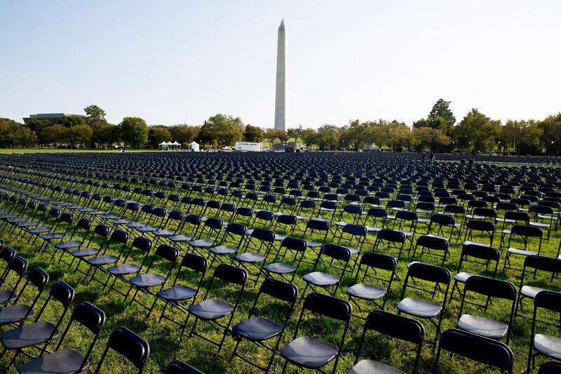 Twenty thousand empty chairs are placed on the Ellipse near the White House to memorialize over 200,000 people in the US who died with COVID-19. EPA
