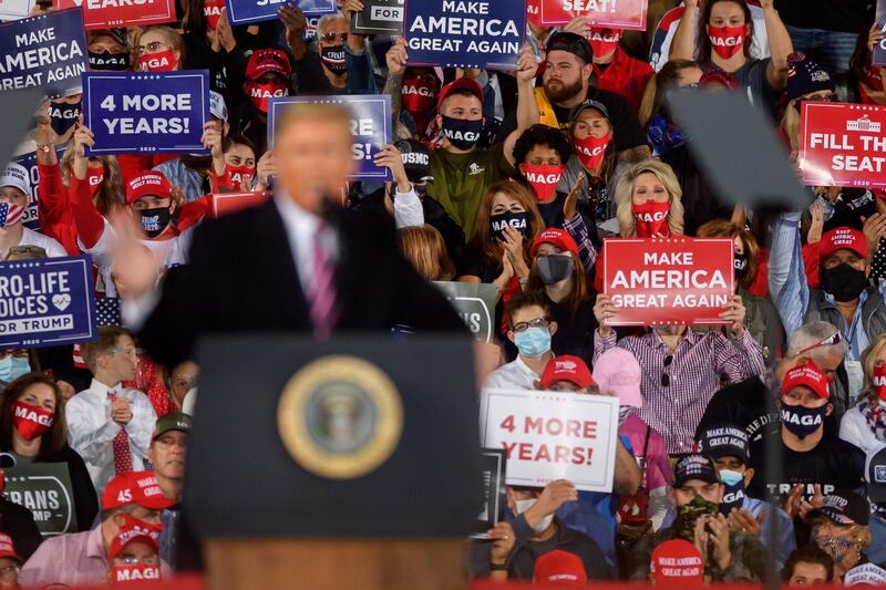 Supporters listen to President Donald Trump speak at a campaign rally at Atlantic Aviation on September 22, 2020 in Moon Township, Pennsylvania. Trump won Pennsylvania by less than a percentage point in 2016.  AFP