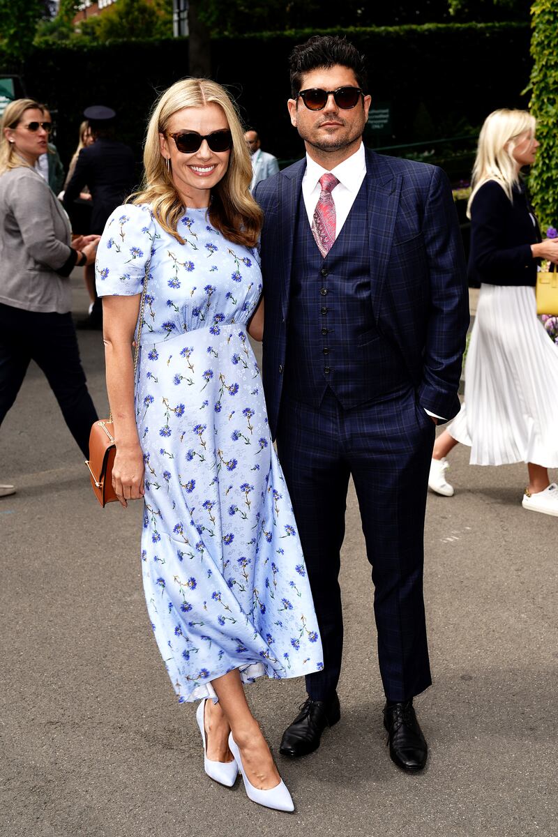 Singer Katherine Jenkins, left, and Andrew Levitas arrives during day five. PA