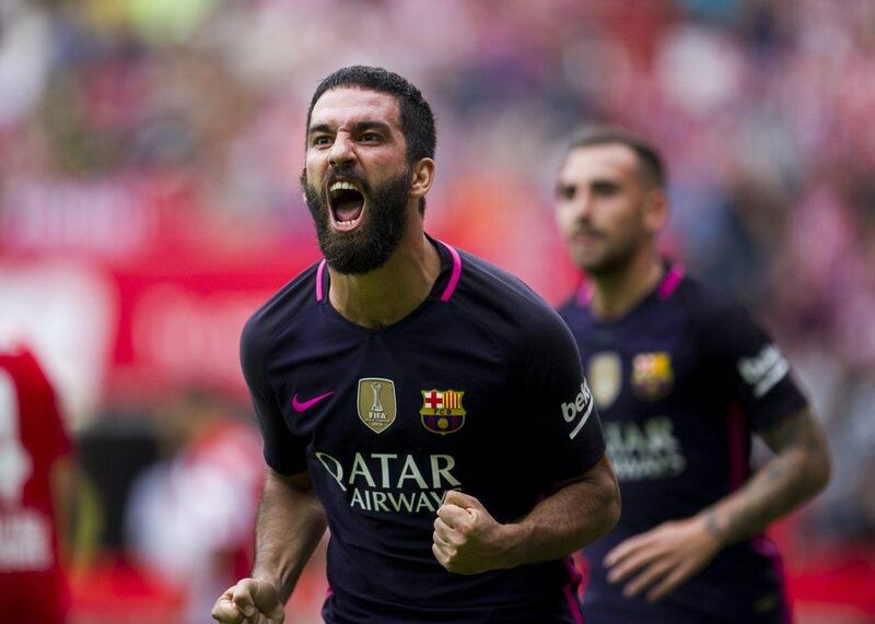 Arda Turan celebrates scoring Barcelona’s fourth goal. Juan Manuel Serrano Arce / Getty Images