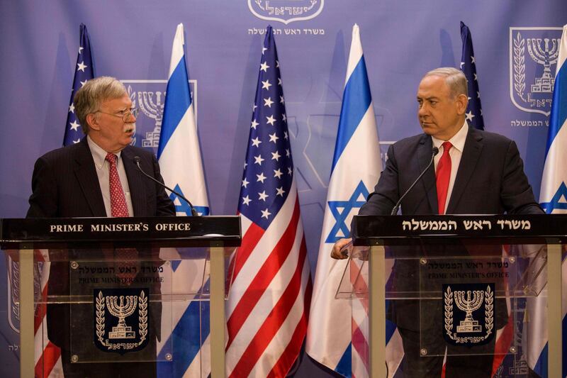 Israeli Prime Minister Benjamin Netanyahu (R) and visiting US National Security Advisor John Bolton give a press conference in Jerusalem on June 23, 2019.  / AFP / POOL / Tsafrir Abayov
