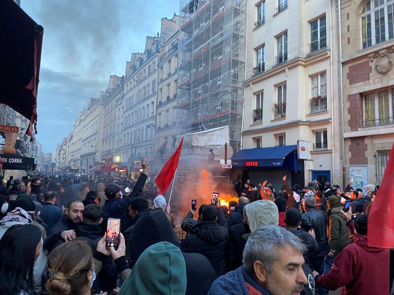 Protesters clash with French police near the Rue d'Enghien in Paris, after the shooting. Reuters