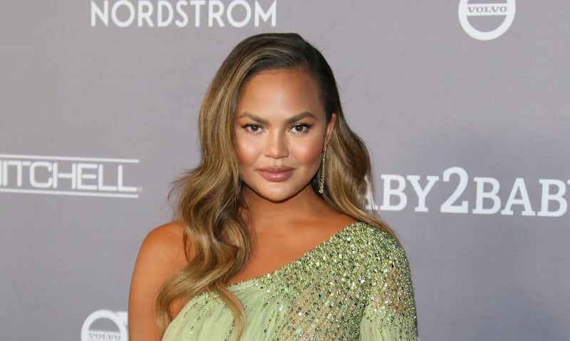 US model Chrissy Teigen arrives for the 2019 Baby2Baby Fundraising Gala at 3Labs in Culver City, California on November 9, 2019. Baby2Baby will honor Chrissy Teigen with the “Giving Tree Award,” presented by John Legend, for her commitment to children in need.  / AFP / Jean-Baptiste LACROIX
