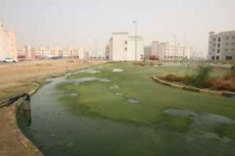 Dubai, 3rd July 2008.  Floods receeded at the Russia Cluster in International City.  (Jeffrey E. Biteng / The National) *** Local Caption ***  JB0428-Flood.jpg