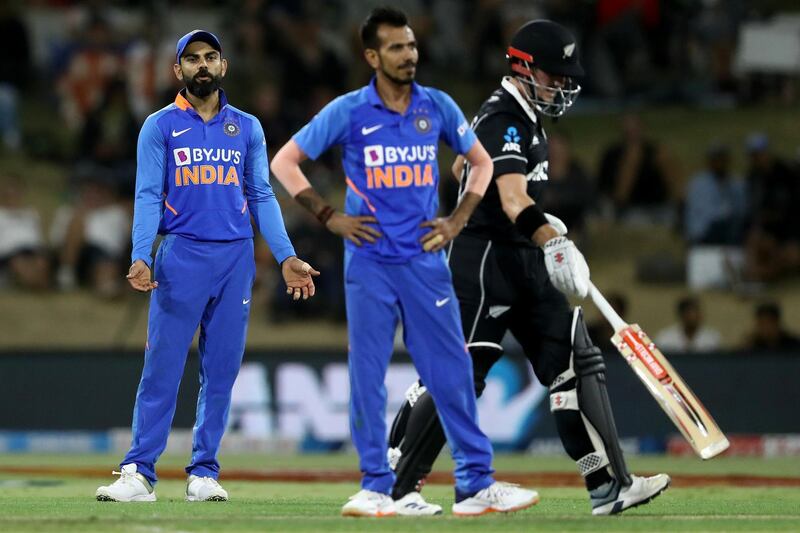 Virat Kohli of India questions Yuzvendra Chahal during game three. Getty