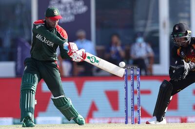 Bangladesh's Shakib Al Hasan starred with bat and ball against Papua New Guinea at the Oman Cricket Academy Ground. AFP