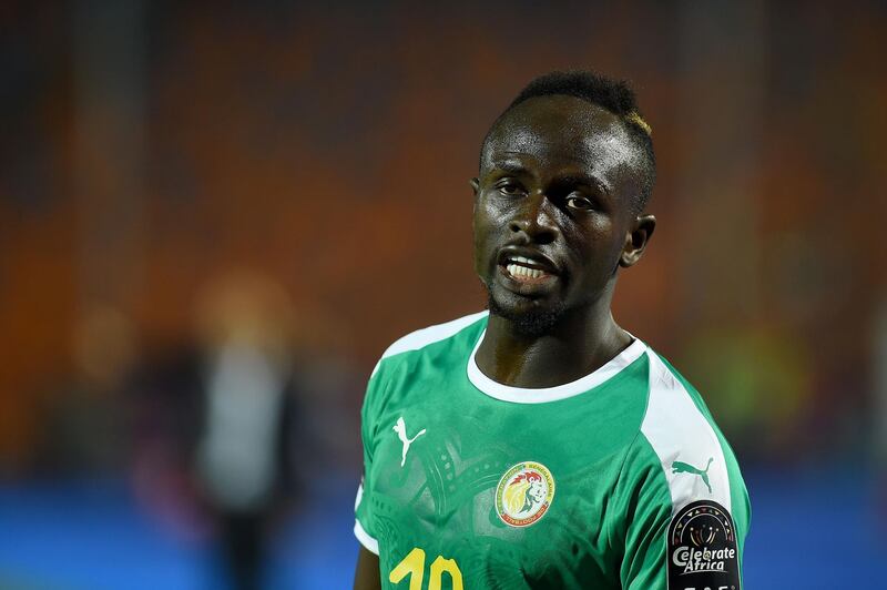 Senegal's forward Sadio Mane looks on after scoring a goal during the 2019 Africa Cup of Nations (CAN) Round of 16 football match between Uganda and Senegal at the Cairo International Stadium in the Egyptian capital on July 5, 2019.  / AFP / MOHAMED EL-SHAHED                   
