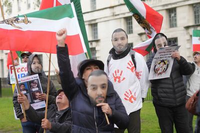 People rally opposite Downing Street in London, to protest against Iran's sentencing to death of rapper Toomaj Salehi, last month. PA