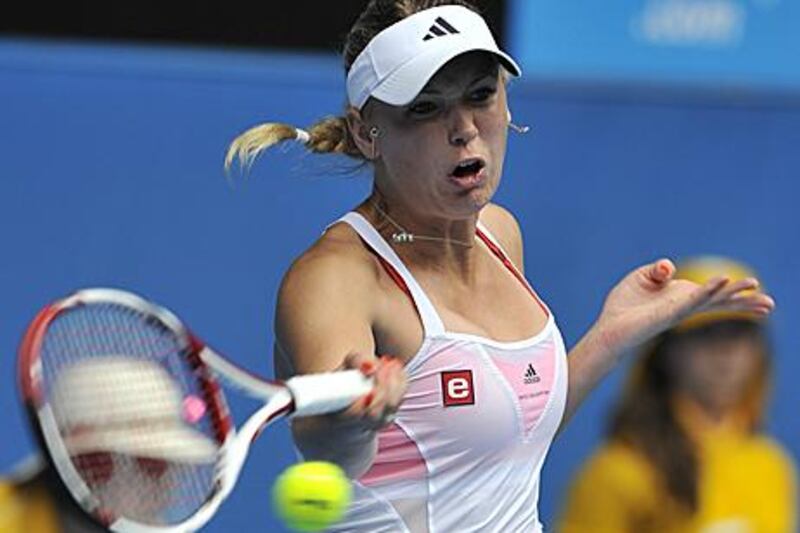 Caroline Wozniacki of Denmark is rising to the challenge as being the world No 1 at a major tournament.