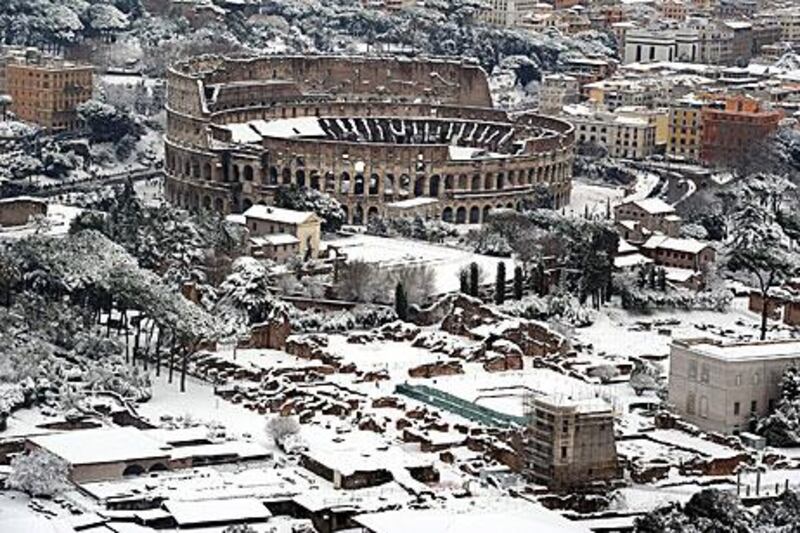 Snow in Rome forced tourist authorities to close the Colosseum as vast amounts of Europe remain affected by winter weather.