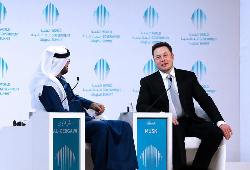 Dubai, United Arab Emirates - February 13, 2017.  ( Right to Left )  Elon Musk ( Co Founder and CEO - Tesla ) gestures as Mohammad Al Gergawi ( Minister of Cabinet Affairs in the Federal Government of the UAE ) acts as the moderator on the ongoing conversation for the World Government Summit.  ( Jeffrey E Biteng / The National )  Editor's Note;  ID 74442 *** Local Caption ***  JB130217-Tesla12.jpg