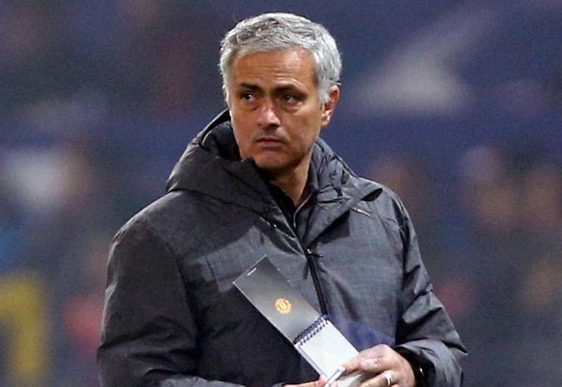 FILE - In this Tuesday, Oct. 31, 2017 file photo, Manchester United coach Jose Mourinho looks on during their Champions League group A soccer match against Benfica, at Old Trafford, in Manchester, England. Jose Mourinho has extended his contract at Manchester United, tying him to the Premier League club until at least 2020. United announced the new deal for its manager on Thursday, Jan. 25, 2018. (AP Photo/Dave Thompson, file)