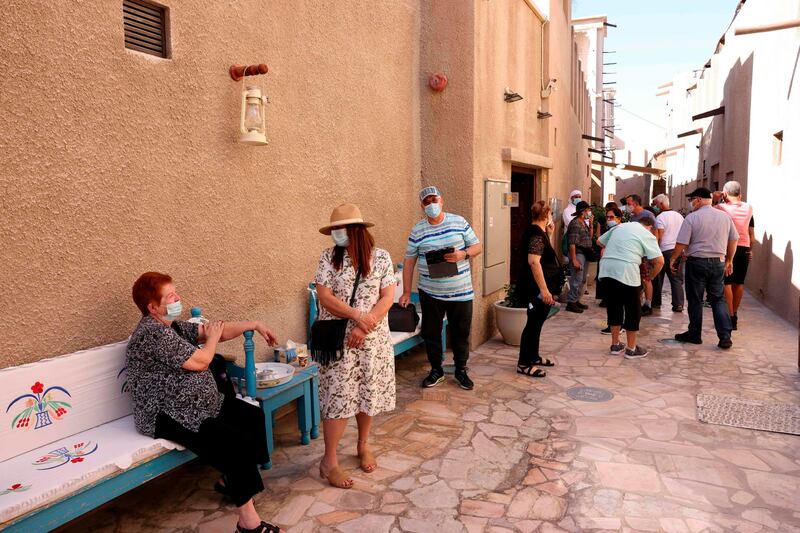 Tourists visit the historic Al Fahidi neighbourhood of Dubai. AFP
