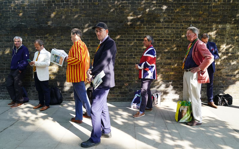 MCC members queue up to enter the Lord's Cricket Ground. PA