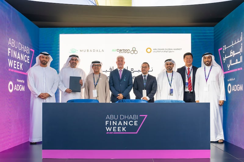 The agreement was signed by Badr Al Olama, executive director, UAE Clusters at Mubadala; Dhaher Bin Dhaher, chief executive of Registration Authority at ADGM; and William Pazos, managing director of AirCarbon Exchange. Source: ADGM