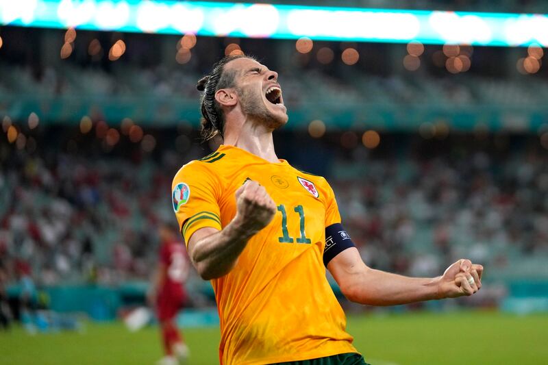 Gareth Bale celebrates after Wales' second goal during the Euro 2020 match against Turkey at Baku Olympic Stadium in June 2021. Getty