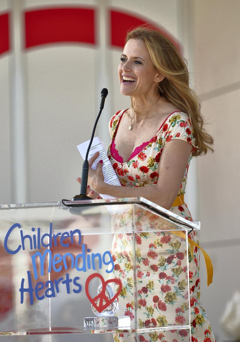 BEVERLY HILLS, CA - JUNE 09: Actress Kelly Preston attends the 1st Annual Children Mending Hearts Style Sunday on June 9, 2013 in Beverly Hills, California.   Charley Gallay/Getty Images for Children Mending Hearts/AFP