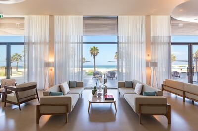 Floor-to-ceiling windows bring the beach into the resort's Soul Lounge. Photo: Nikki Beach Resort & Spa