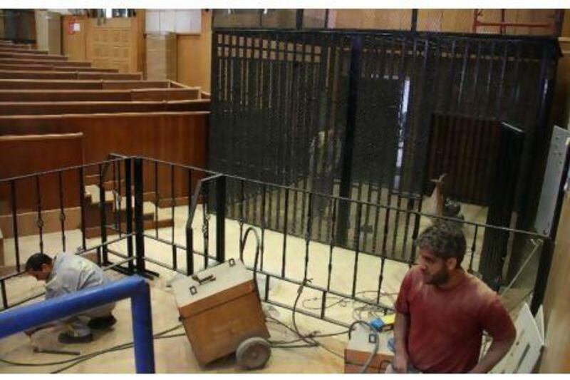 The cage where former Egyptian president Hosni Mubarak and his aides are due to be during their trial at the police academy on the outskirts of Cairo yesterday. Ahmed Khaled / EPA