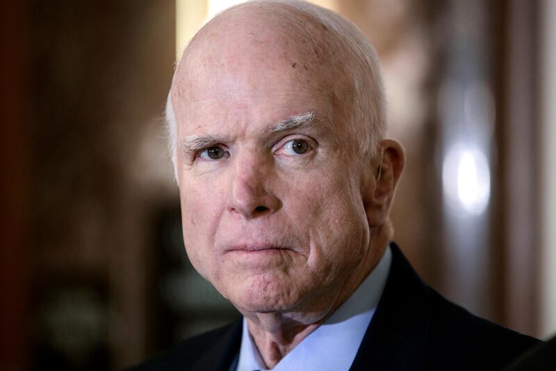 FILE - In this Oct. 25, 2017 file photo, Senate Armed Services Chairman John McCain, R-Ariz., pauses before speaking to reporters during a meeting of the National Defense Authorization Act conferees, on Capitol Hill in Washington. McCainâ€™s family says the Arizona senator has chosen to discontinue medical treatment for brain cancer. (AP Photo/J. Scott Applewhite, File)