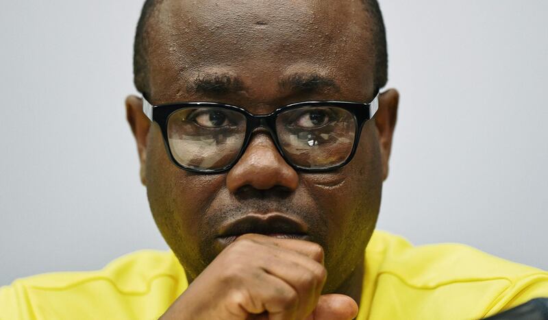 (FILES) In this file photo taken on June 23, 2014 President of The Ghana Football Association Kwesi Nyantakyi answers questions during a press conference in Maceio during the 2014 FIFA World Cup.  An explosive documentary has rocked Ghana's football association, showing executives including the organisation's head allegedly proposing bribes worth millions of euros. Nyantakyi was caught suggesting lucrative deals to undercover journalists posing as "investors" in the film "Number 12", which was shown pn June 6, 2018 at a preview attended by diplomats and politicians in the capital Accra. / AFP / Carl DE SOUZA
