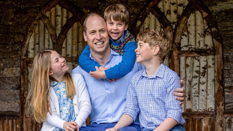 Prince William, centre, with his children Princess Charlotte, Prince Louis and Prince George, right, on June 17. Reuters