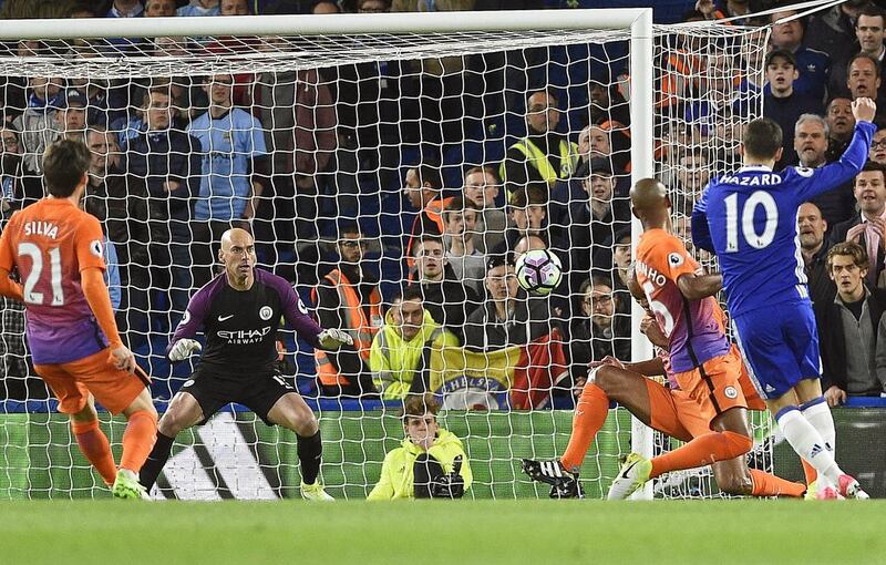 Chelsea's Eden Hazard, right, scores Chelsea's first goal. Gerry Penny / EPA