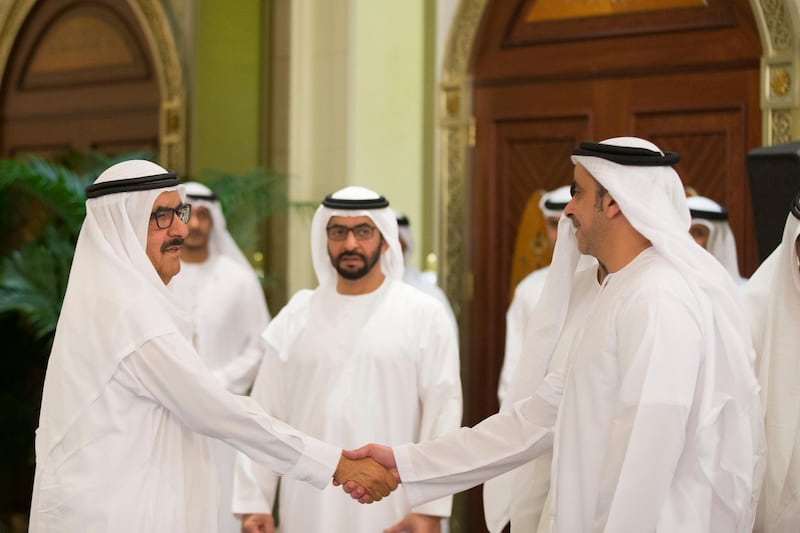 ABU DHABI, UNITED ARAB EMIRATES - July 01, 2014:  HH Sheikh Hamdan bin Rashid Al Maktoum Deputy Ruler of Dubai Minister of Finance and Industry (L) greets HH Lt General Sheikh Saif bin Zayed Al Nahyan Deputy Prime Minister and Minister of Interior (R) during an iftar reception at Mushrif Palace. Seen with HH Sheikh Hamdan bin Zayed Al Nahyan Deputy Prime Minister and Ruler of the Western Region  (Back C).

( Mohamed Al Hammadi / Crown Prince Court - Abu Dhabi )
---