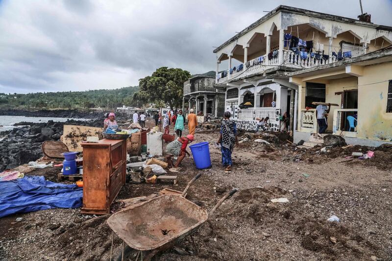 Residents gather their belongings on April 27, 2019 in Fumbuni, 56km south of Comoros capital Moroni, following the passage of the Cyclone Kenneth. Thousands of people in remote areas of storm-lashed Mozambique were homeless Saturday and bracing for imminent flooding, food and water shortages as Cyclone Kenneth flattened entire villages, leaving rescuers struggling to reach them. AFP