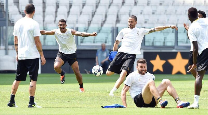 Juventus players take part in training ahead of the Uefa Champions League final in Cardiff, Wales on Saturday. Alessandro Di Marco / EPA