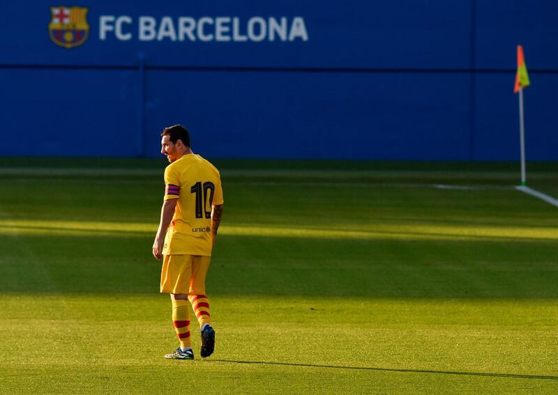 Lionel Messi looks during a friendly match between Barcelona and Gimnastic at the Johan Cruyff Stadium. AFP